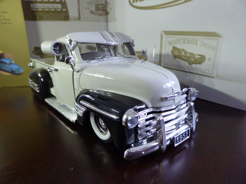 Not a fan of lowrider but like all the additional accessories not included in the other 2. Jada did a great job with the 2 tone look. The cab and bed are molded separately. The hood side emblems which read 3100 is painted on instead of separate parts.